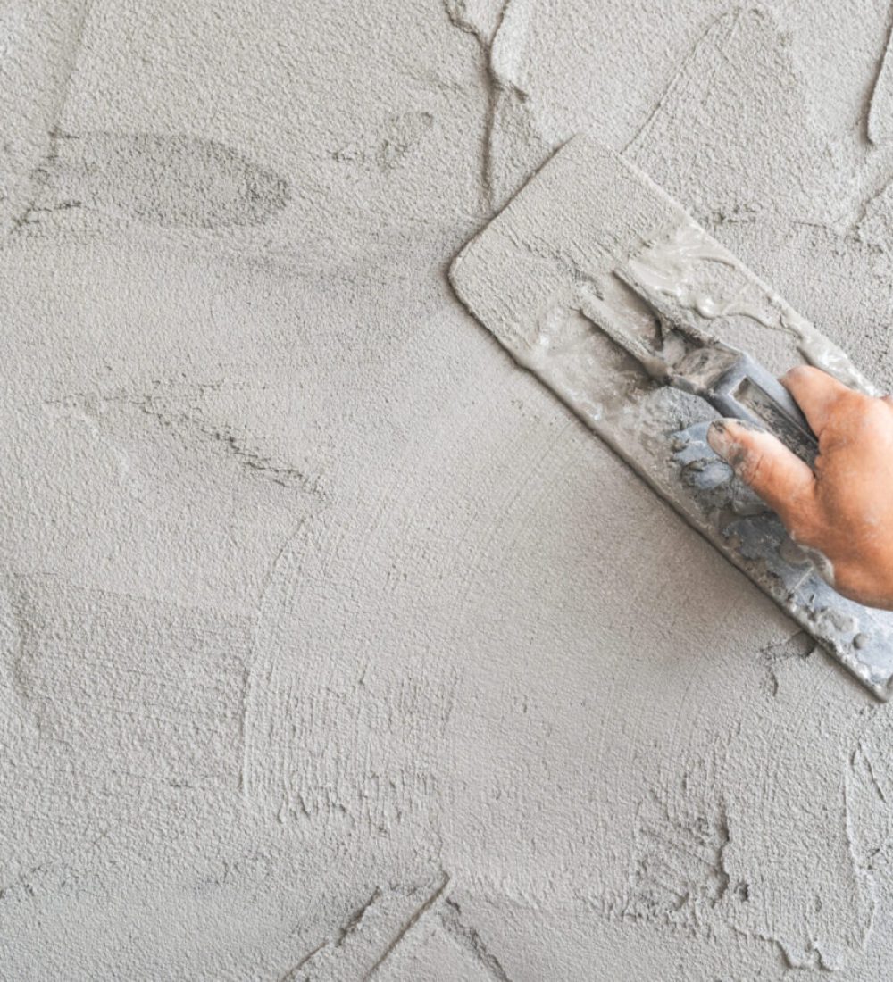 hand-worker-plastering-with-trowel-handle-wet-grey-2026-01-06-11-08-59-utc